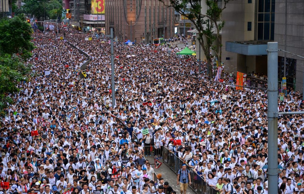 DISTRESS OF NATIONS: Protestors defy police in Hong Kong as crowds swell to 1.7 million