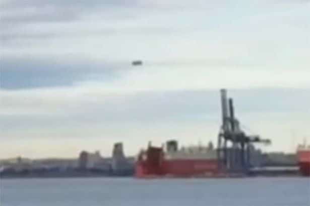 Huge cigar-shaped object ‘with spheres circling it’ seen hovering over Baltimore