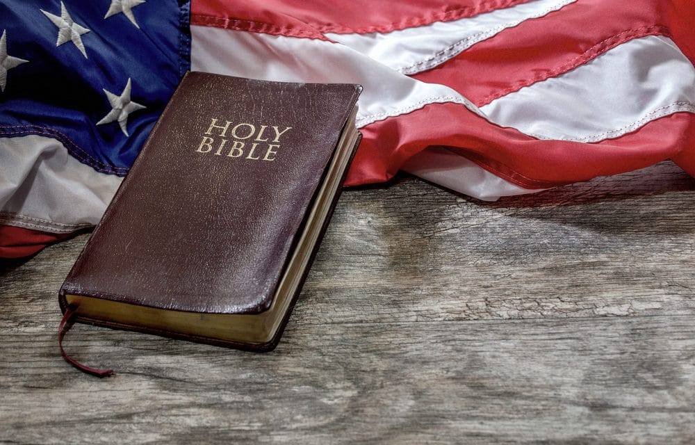 Car Dealership Offering Bible, American Flag and Voucher for Gun with Purchase of Vehicle