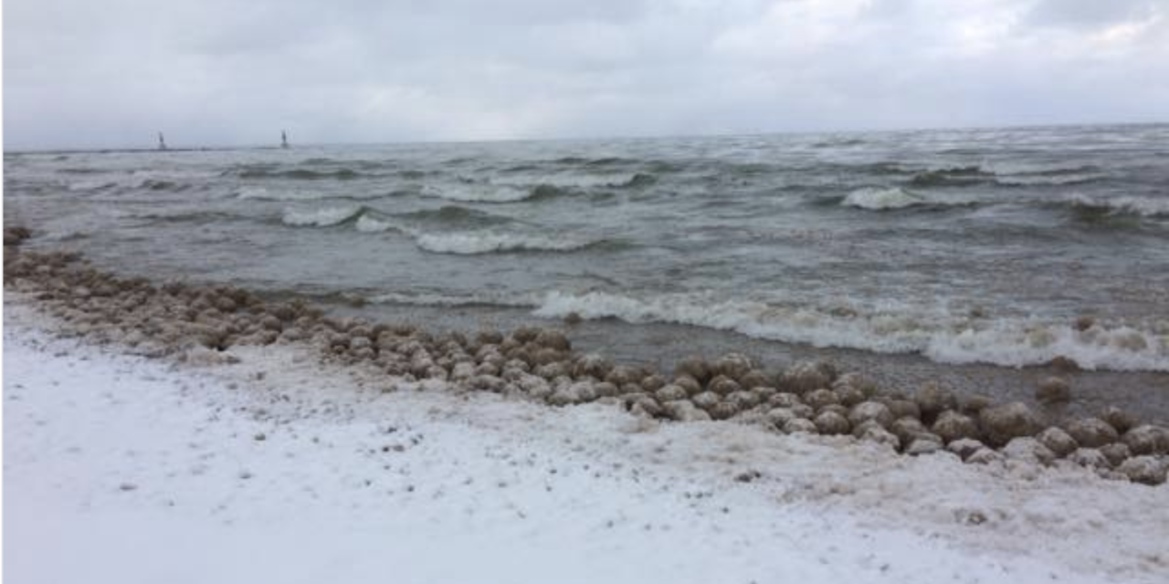 Rare ice volcanoes are erupting and ice balls washing ashore Lake Michigan