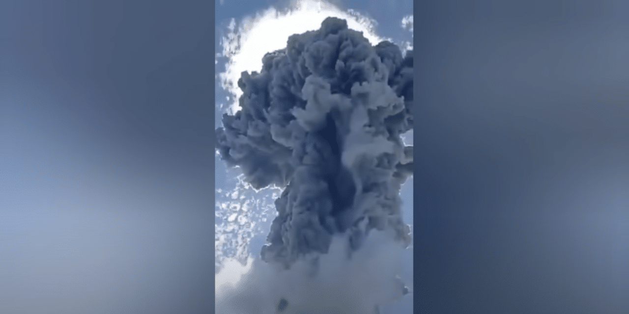 Thousands flee erupting Indonesian volcano