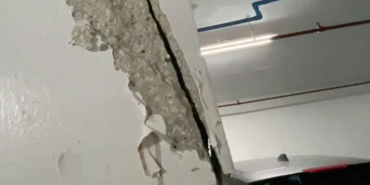 Huge cracks exposed in neighboring building of collapsed condo prompting fears