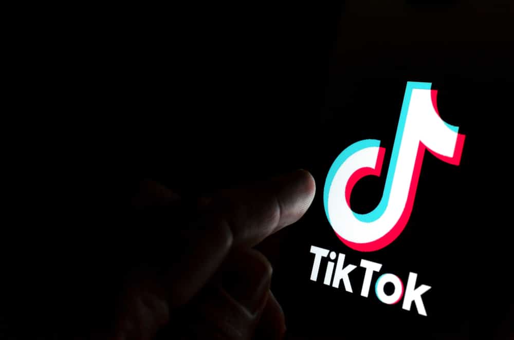 Tiktok,App,Logo,On,Screen,And,A,Finger,Pointing,At | End Time Headlines