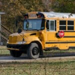 School bus carrying 30 students crashes into Indiana home