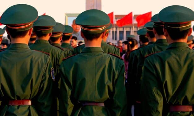 Pelosi on her way to Taiwan, China readies military