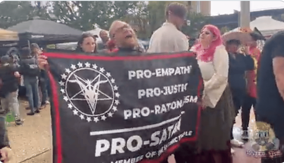(WATCH) Satanists, atheists, heathens, spiritualists, and so-called “other’d folks” come together in Texas to perform “Unbaptisms.”