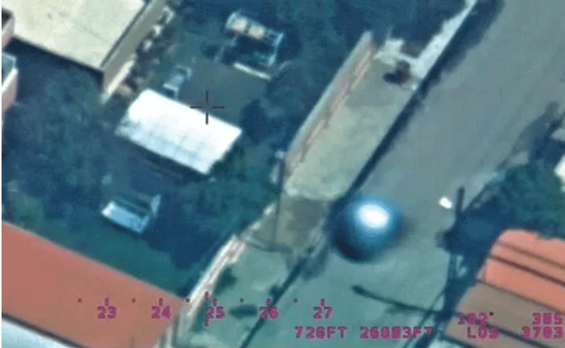 Spy plane photo reveals metallic orb UFO flying over Iraq