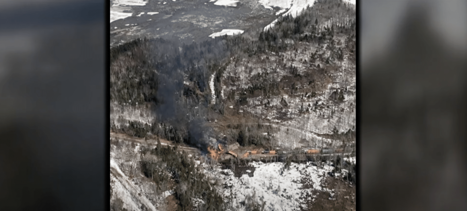 Train derails and causes forest fire in Rockwood, Maine