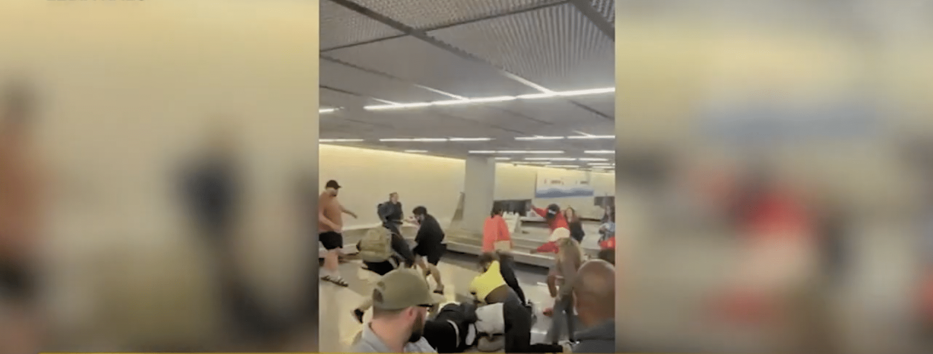 (WATCH) Massive brawl breaks out at Chicago airport baggage claim as travelers yank hair and land blows