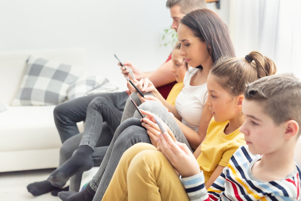 Average parent spends more time on their devices than they do with their children
